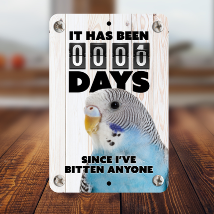 Blue Parakeet Bitten Sign